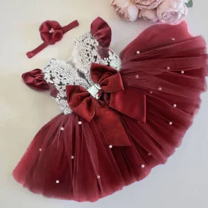 Robe bébé avec haut en dentelle à manches papillon et nœud