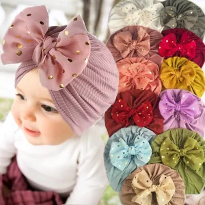 Joli bonnet brillant à nœud papillon pour bébé : joli turban de couleur unie