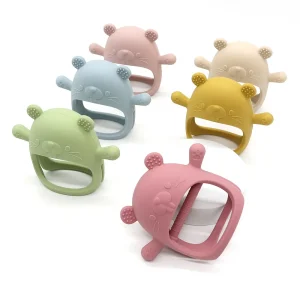 Bracelet de dentition pour bébé : gant en silicone avec anneau et animal de dessin animé